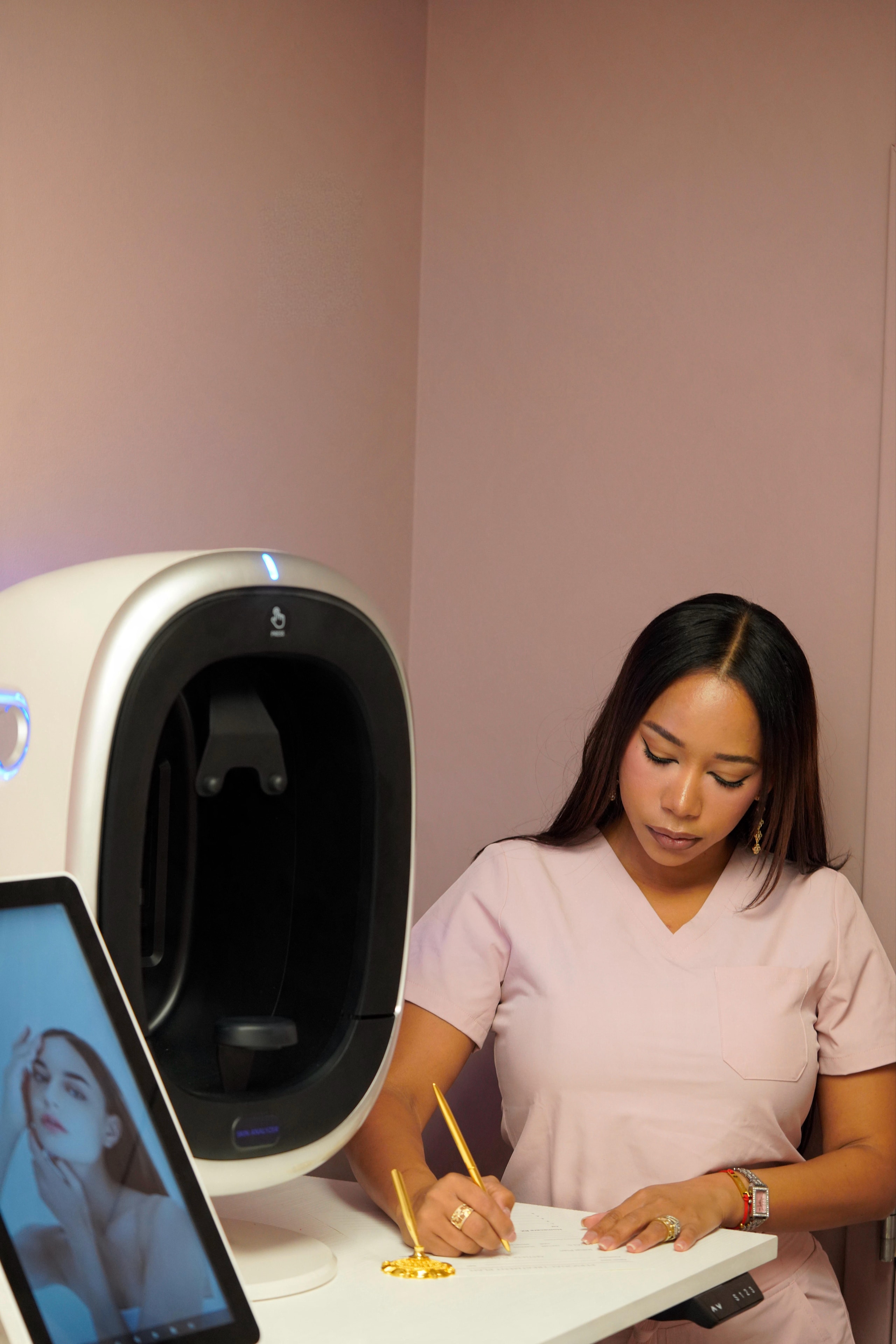 Naida performing advanced skin analysis with clinical imaging technology